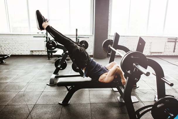 Man exercising at gym - Фото, зображення