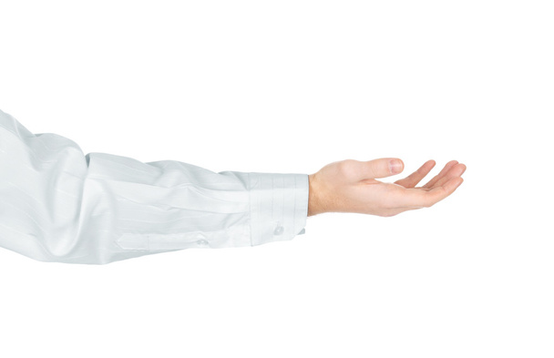A studio shot of a male hand isolated on white background - Zdjęcie, obraz