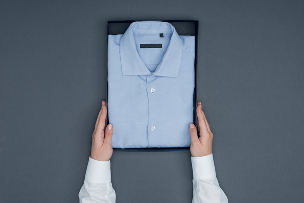 tailor with shirt in box - Photo, Image