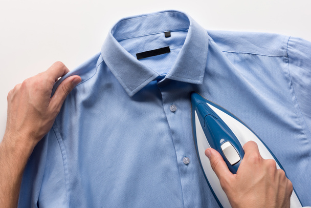 man ironing shirt - Photo, Image