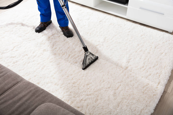 Janitor Cleaning Carpet  - Фото, изображение
