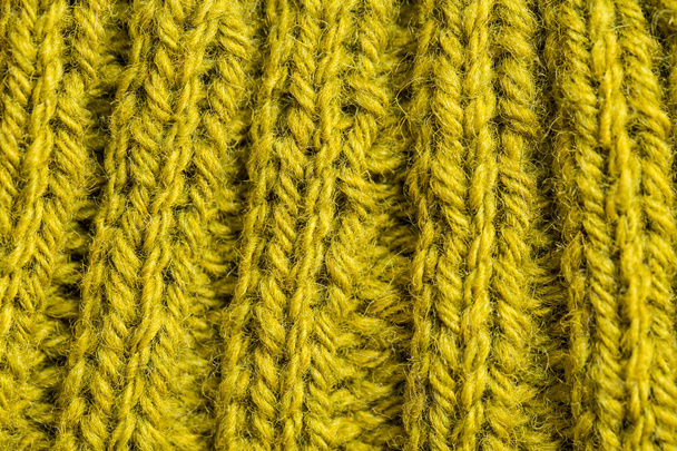 A beautiful closeup of a hand knitted warm and soft wool pattern. Soft socks or scarf of natural wool. Colorful pattern. - Zdjęcie, obraz