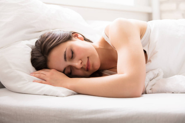 Woman Sleeping On Bed - Valokuva, kuva