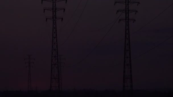 Sunrise on a background of a high-voltage line - Footage, Video