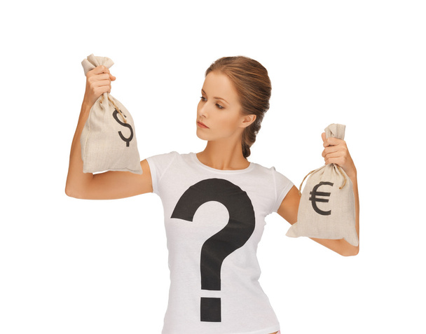 Woman with dollar and euro signed bags - Valokuva, kuva