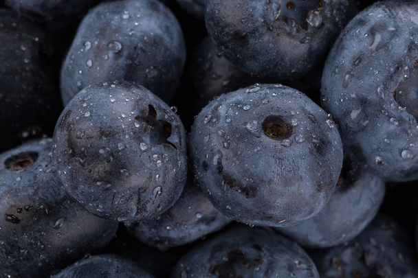 blueberries with water drops close up - Fotó, kép