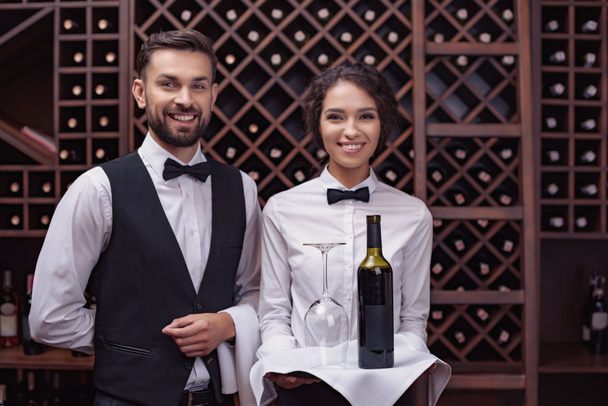 waiters with wine in cellar - Photo, Image