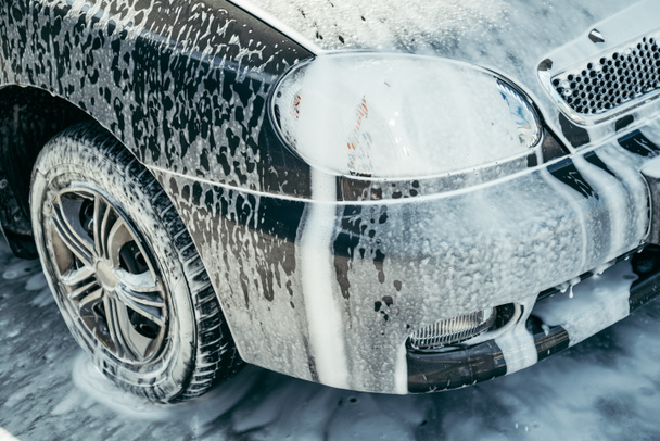 car in foam on carwash - Foto, Imagem