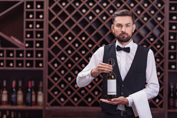 sommelier with bottle of wine - Photo, Image