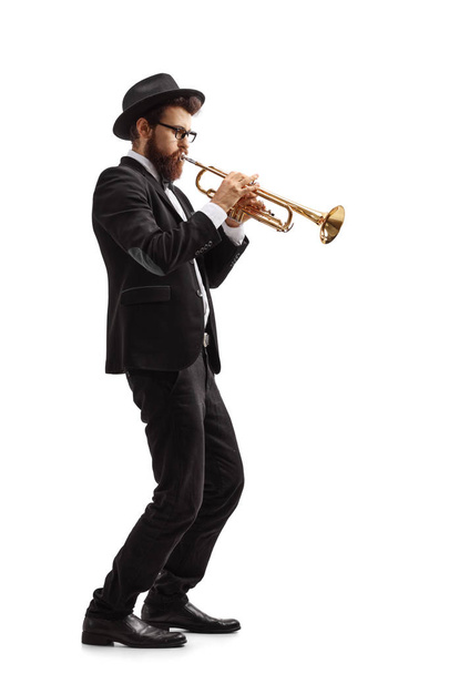 Profiel shot van een trompettist - Foto, afbeelding