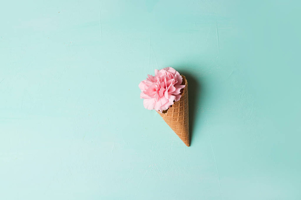 Pink carnation  in waffle cone - Photo, Image
