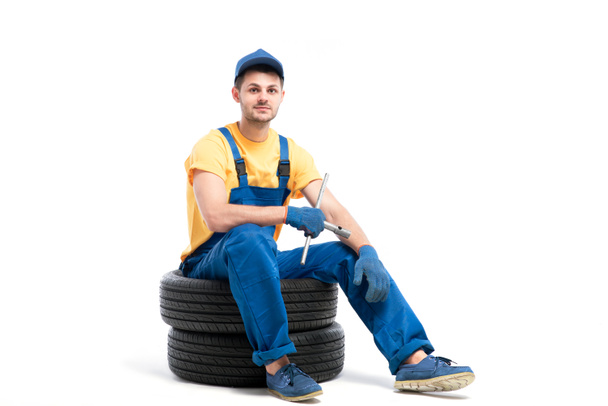 reparador en uniforme azul
 - Foto, Imagen