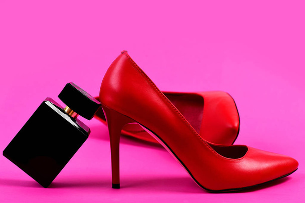 High heel shoes with perfume as fashion and scent concept - 写真・画像