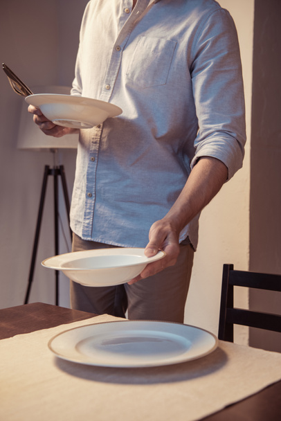 man preparing romantic dinner - Photo, Image