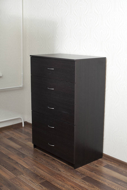 Wood furniture. Wooden dresser in room. - Фото, изображение