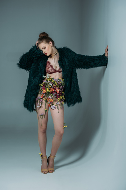 attractive model in floral skirt - Фото, изображение