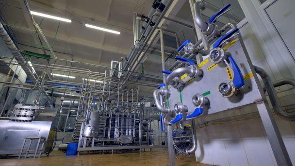 A dairy factory piping system with a control unit. - Footage, Video