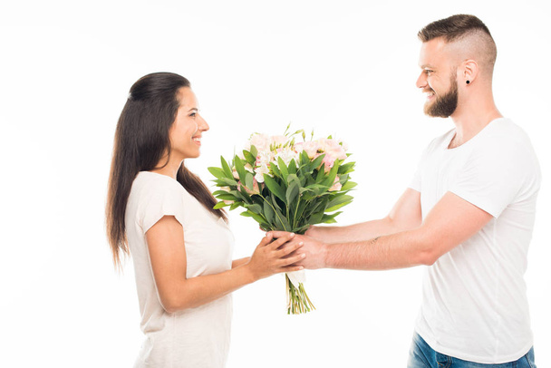 Caucasian couple with bouquet - Photo, Image