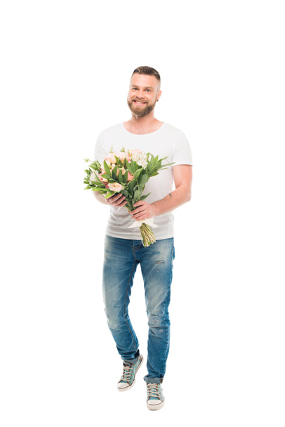 bearded man standing with bouquet - Photo, Image
