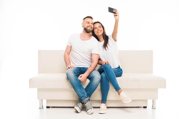 Young couple taking selfie - Foto, afbeelding