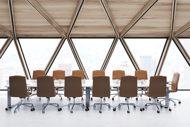 Біла конференц-зал з бежевими стільцями збоку
 - Фото, зображення