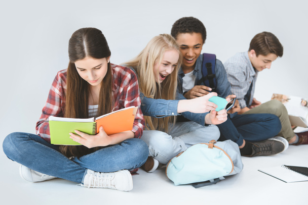 multiethnic students doing homework - Foto, imagen