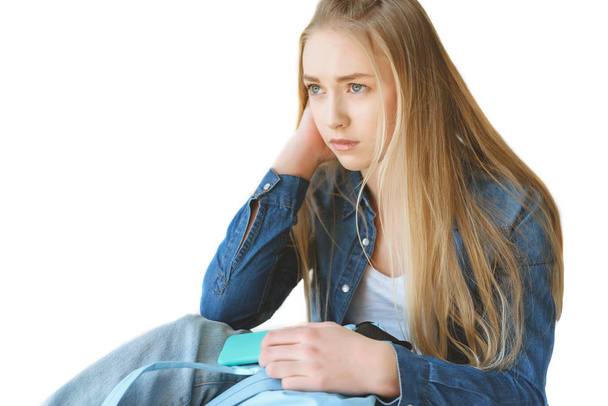 sad teenager with smartphone and backpack - Zdjęcie, obraz