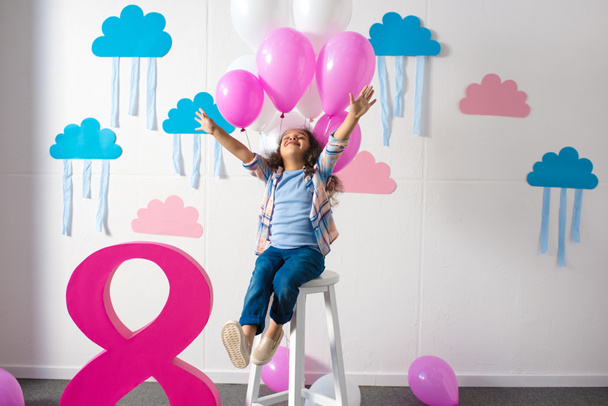 girl with balloons at birthday party - Photo, Image