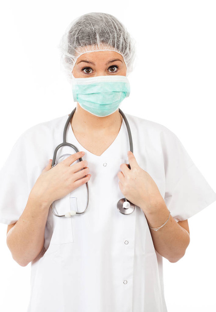 woman doctor with stethoscope and mask - Φωτογραφία, εικόνα