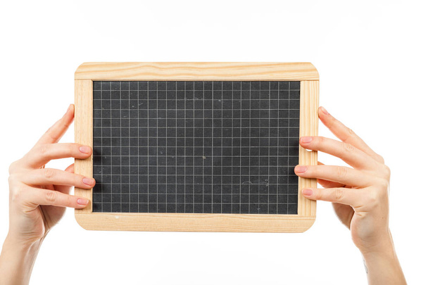 female hands holding blackboard   - Foto, afbeelding