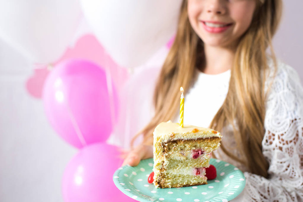girl holding birthday cake - Фото, изображение