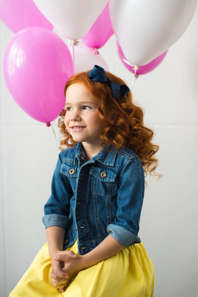redhead girl with balloons - Foto, Imagen
