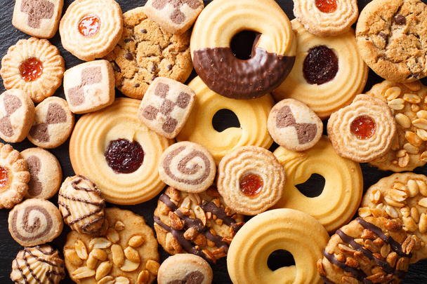 Belos biscoitos variados close-up. fundo horizontal superior v
 - Foto, Imagem