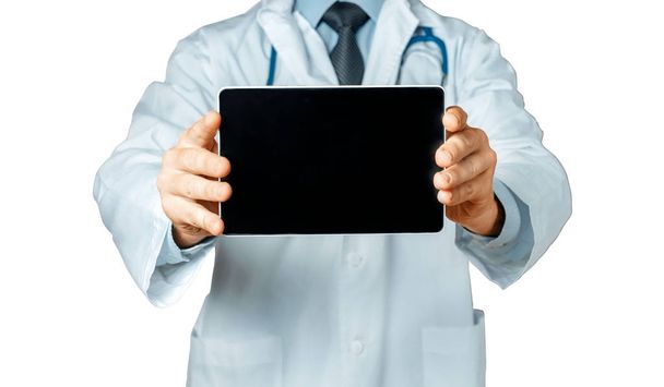 Doctor Holding Blank Digital Tablet With Copy Space And Clipping Path For Screen - Foto, Bild