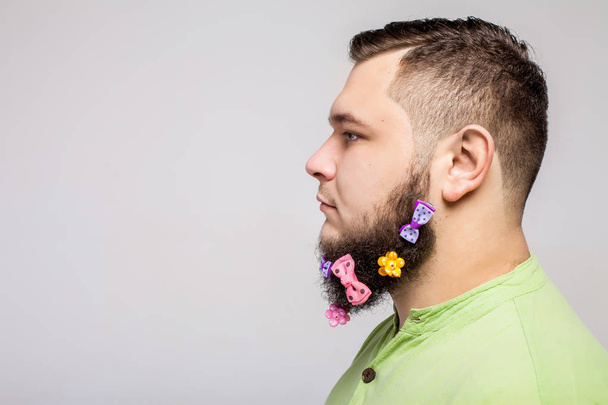 Man with hair clips on beard - Foto, Imagem