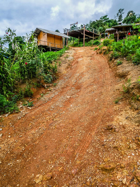 Dirt road and house on Doi Luang mountain at Chiang Dao, Chiang Mai, Thailand - Photo, Image