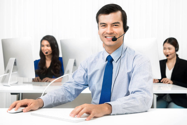 Customer service staffs in call center - Photo, Image