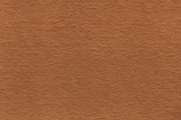 Textura de papel marrón claro antiguo primer plano. La composición del cartón denso. El fondo de bronce
. - Foto, imagen