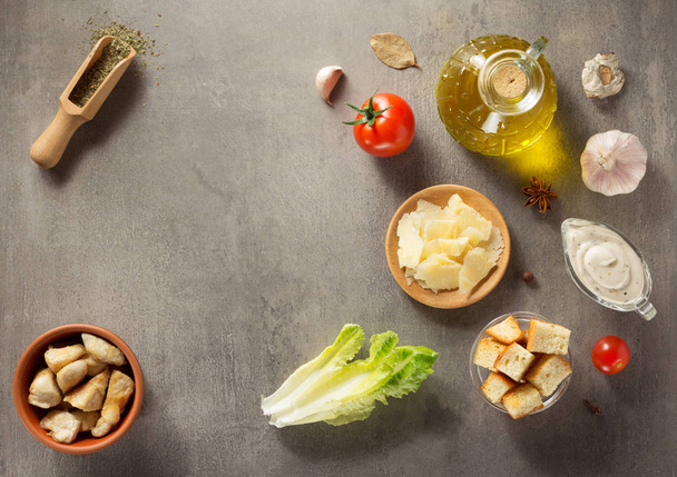 caesar salad ingredients at stone  table  - 写真・画像