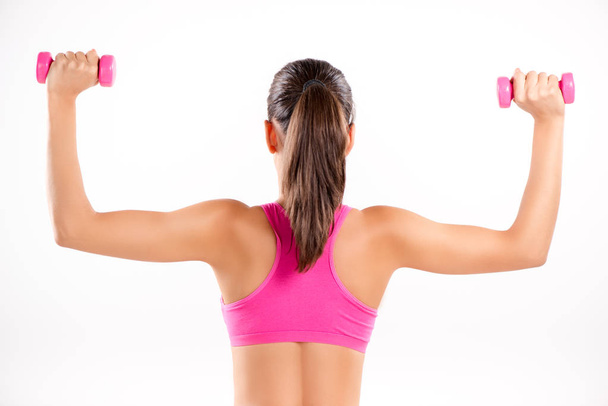woman doing exercise to strengthen shoulders   - Foto, Imagen