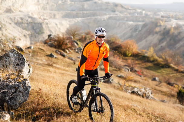 Mountain Bike cyclist riding Meadow track - Photo, Image