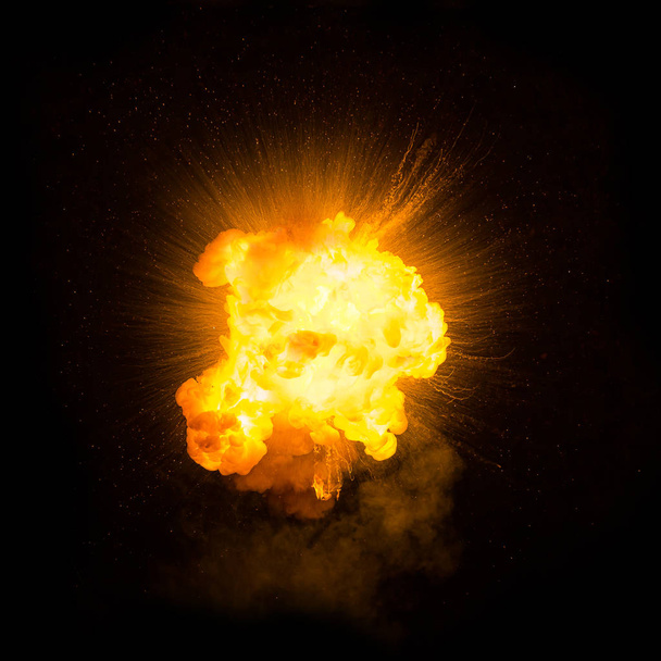 яркая вспышка взрыва на черном фоне. вспышка огня
 - Фото, изображение