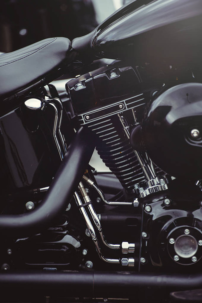 Beautiful stylish black motor powerful motorcycle art shooting on the calendar - Photo, Image