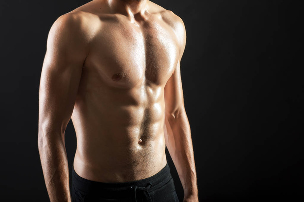 Strong muscular torso of young sexy man - Φωτογραφία, εικόνα