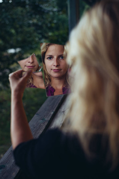 Woman in broken mirror - Photo, Image
