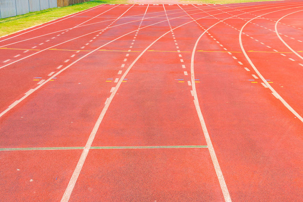 Athletics stadium running track  - Foto, afbeelding