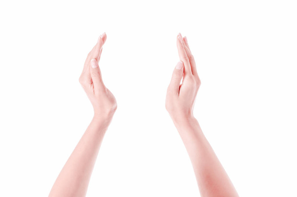 Female hands as if holding something. - Foto, imagen