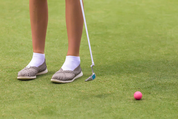 Low section of female golf player - Фото, изображение