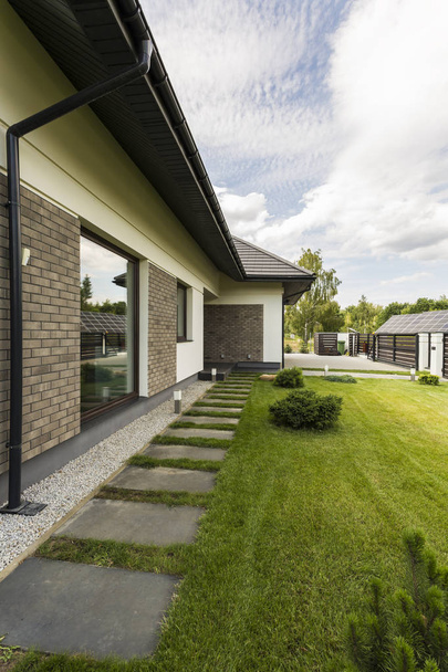 Elegant detached house exterior with garden - Photo, Image