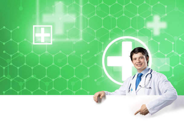 doctor holding white blank banner - Photo, image